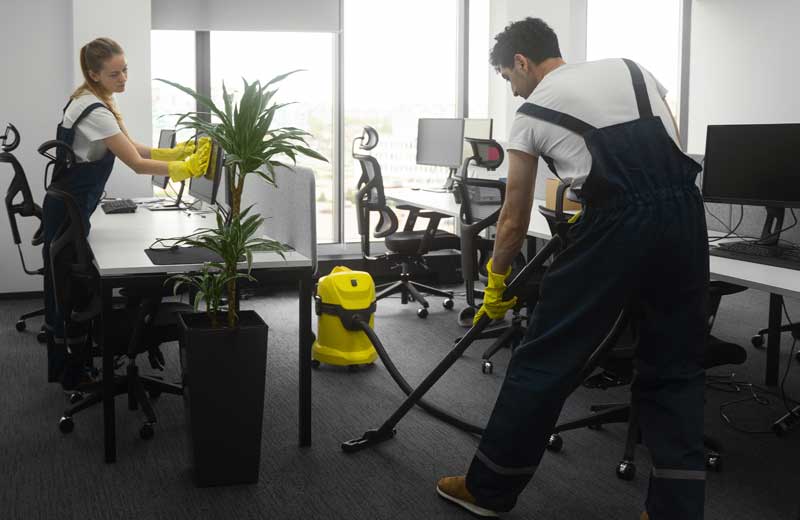 full shot people cleaning office