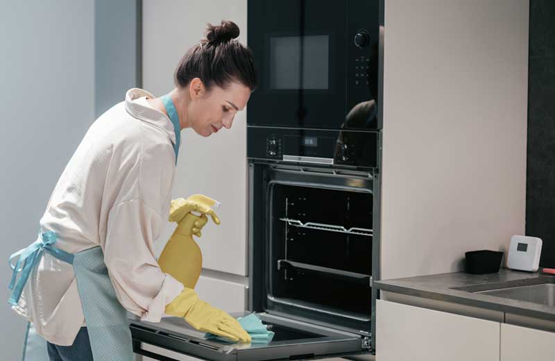 cleaning kitchen housewife yellow gloves cleaning kitchen